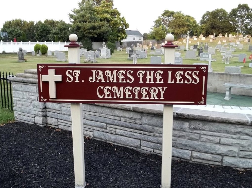 Saint James the Less Cemetery entrance sign and cemetery grounds